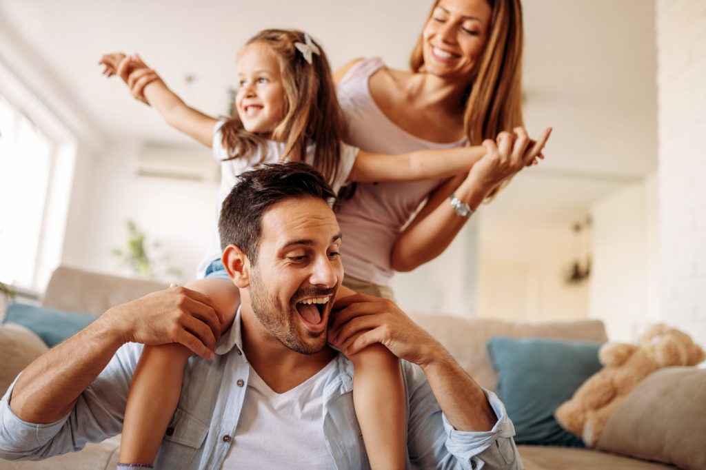 Happy family having fun time together at home